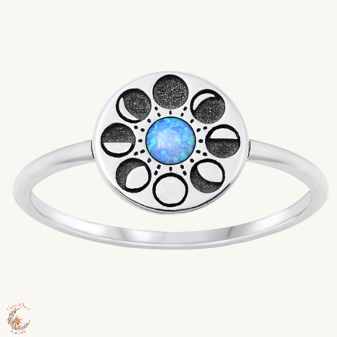Sortija facetas de lunas con opal azul