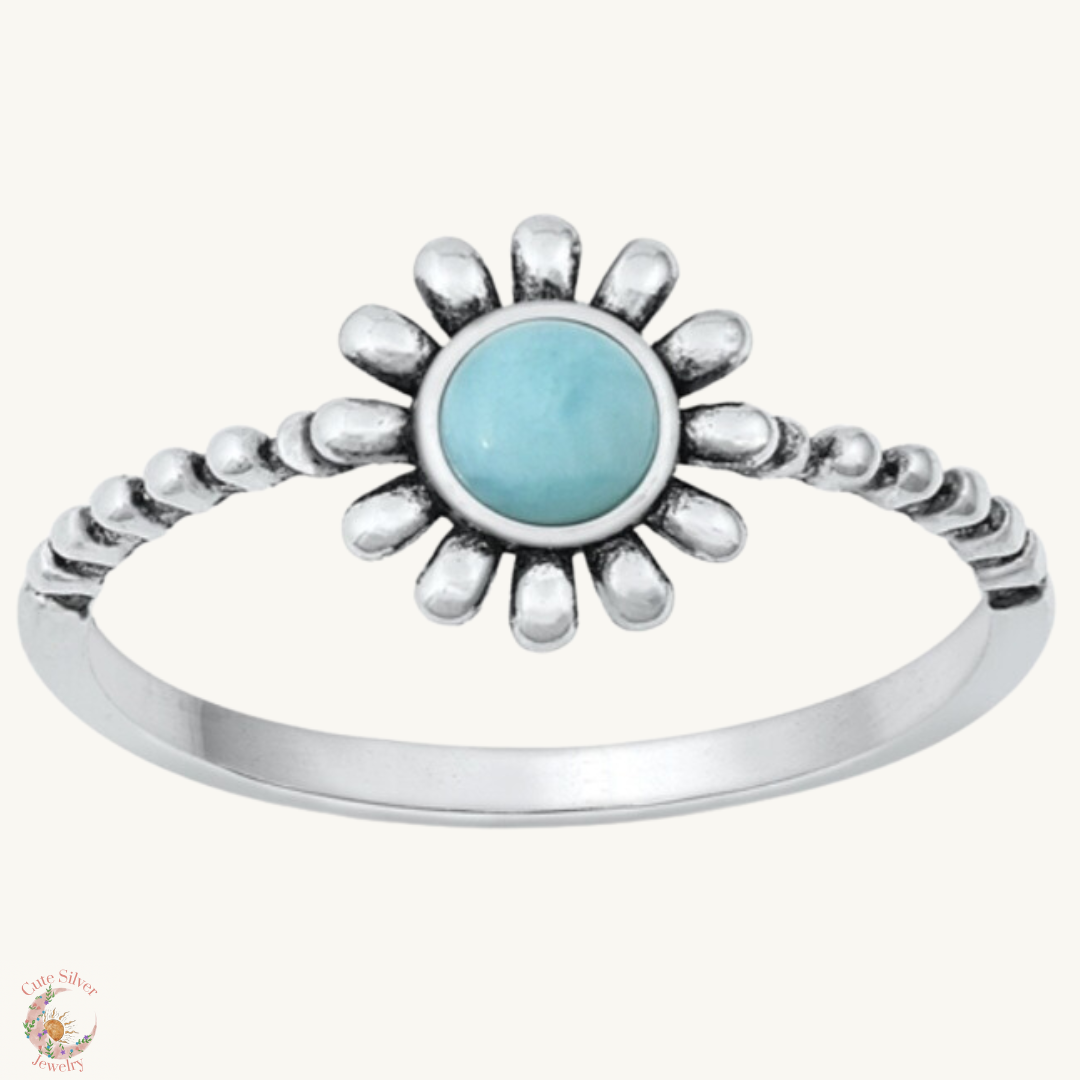 Sortija de flor con piedra larimar