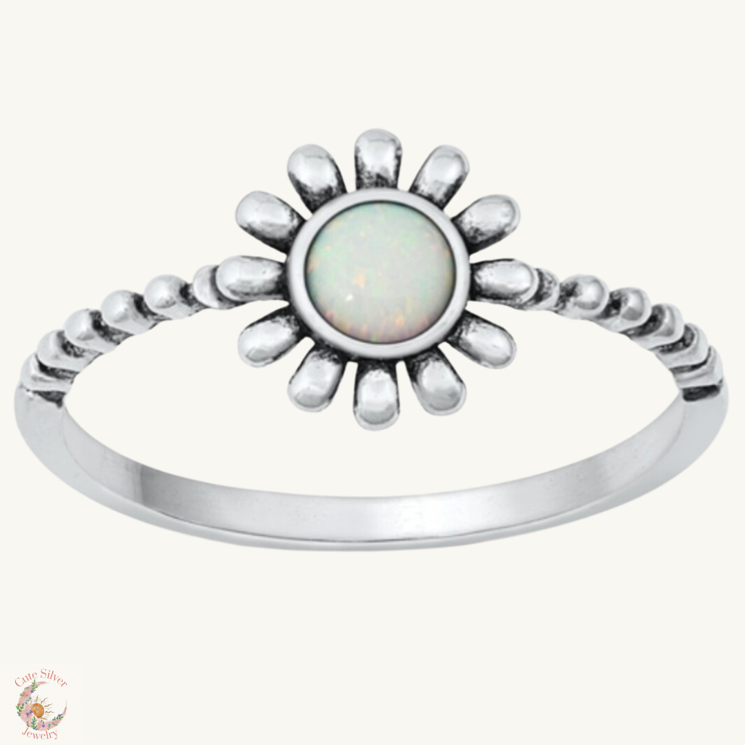 Sortija de flor con piedra opal