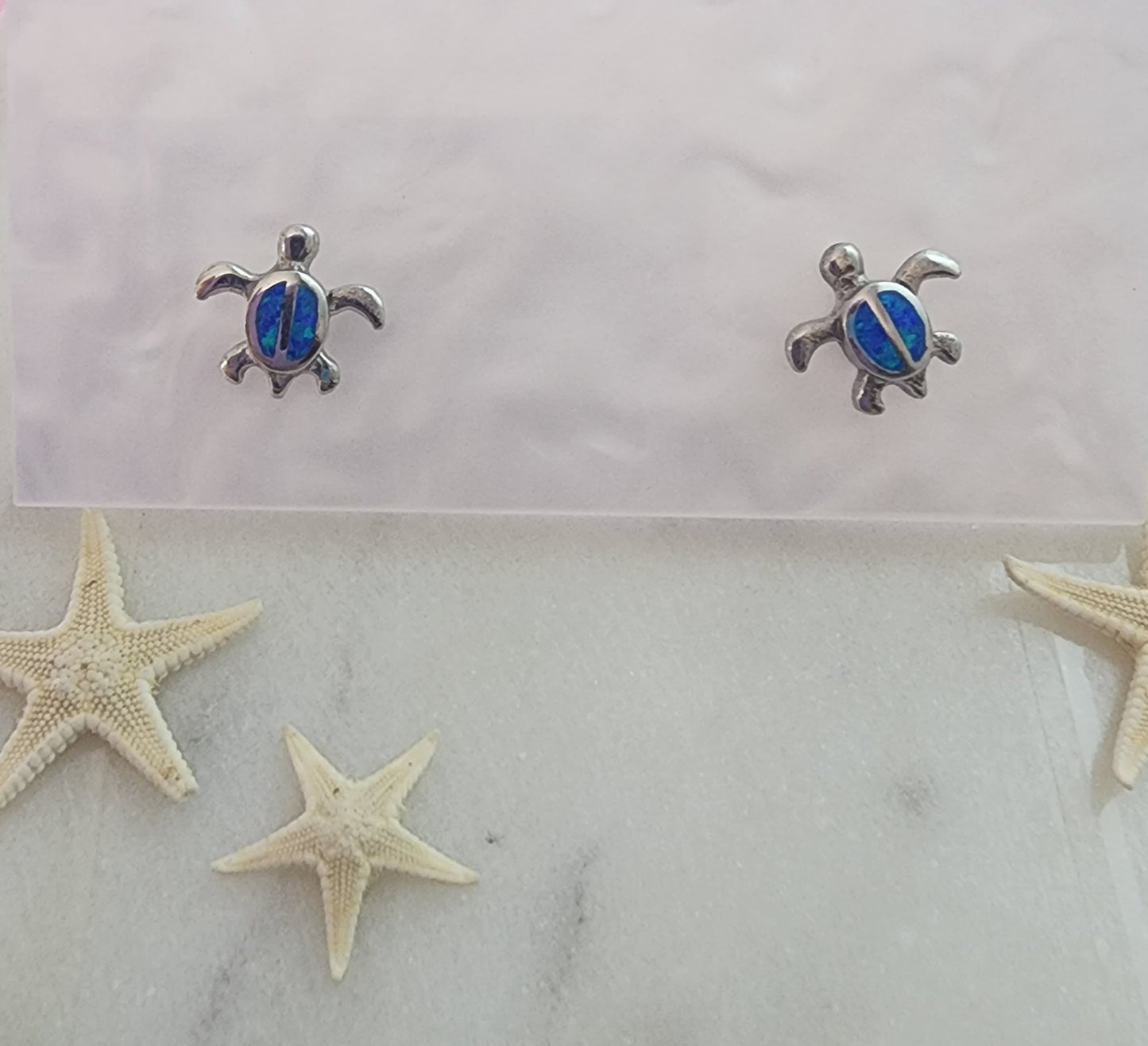 Pantallas de tortugas con piedras opal
