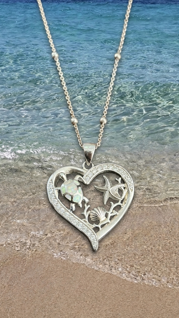 Collar de corazón con tortuga opal blanco, estrella de mar y concha