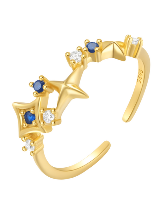 Sortija con estrellas doradas