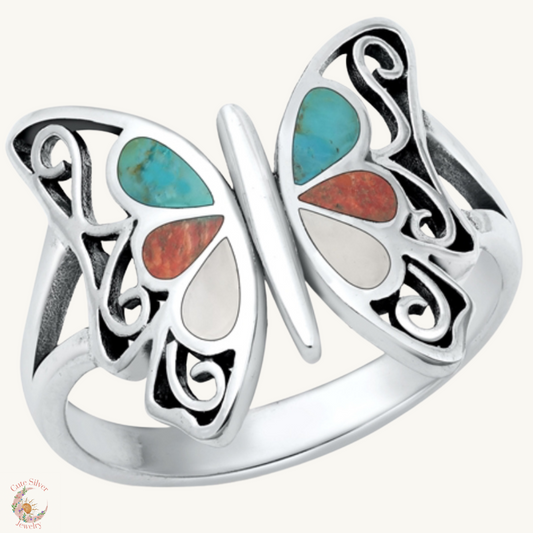 Mariposa con piedras turquesa moonstone y tigre de ojo