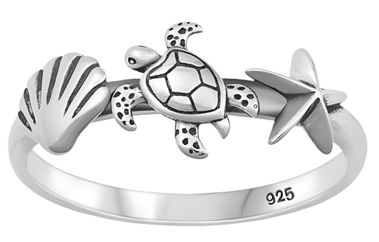 Sortija de tortuga con estrella y concha
