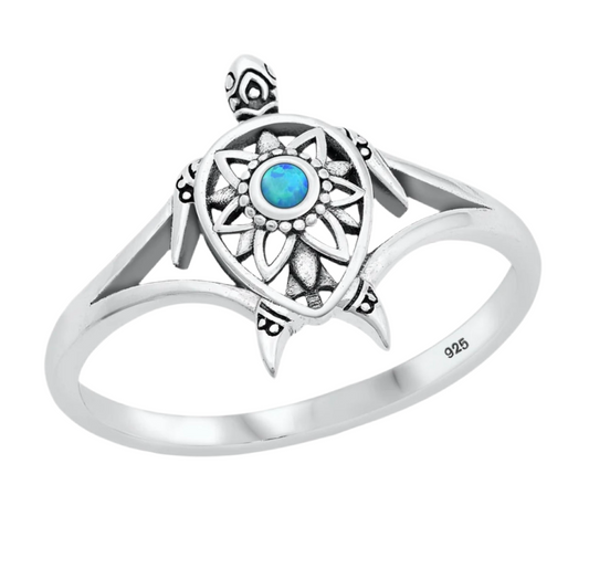 Sortija de tortuga con piedra opal azul