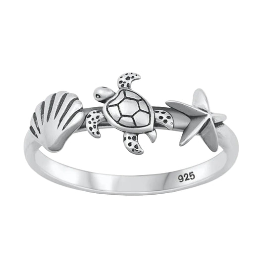 Sortija de tortuga con estrella y concha