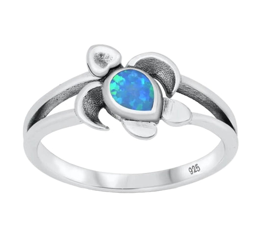 Sortija de tortuga con piedra opal azul