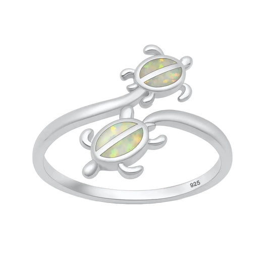 Sortija de tortugas con piedra opal blanco