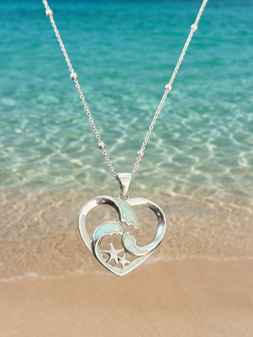 Collar de olas y estrellas de mar en corazón con piedra opal blanco