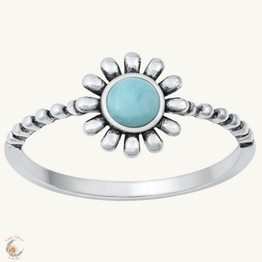 Sortija de flor con piedra larimar